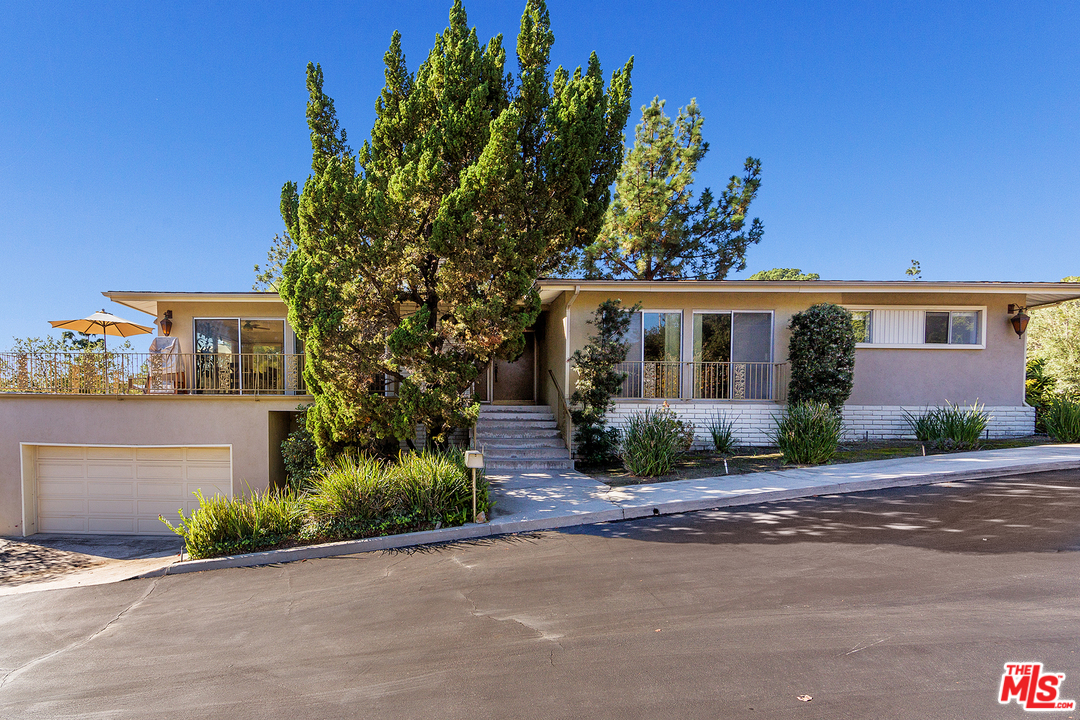 3088 Paddington Road Glendale, CA 91206 - Photo 4 of 17 front view of a house with a street