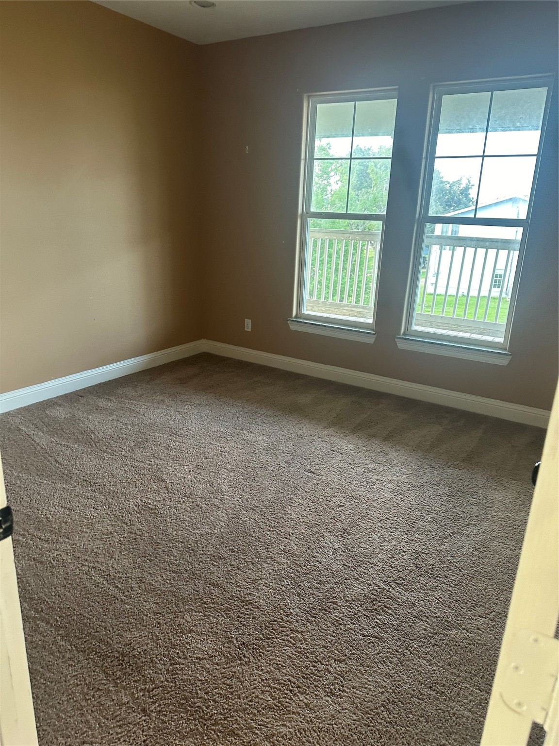 205 Rue Orleans Street Baytown, TX 77520 - Photo 14 of 43 an empty room with a window