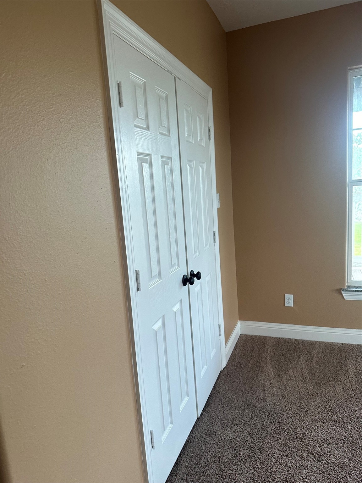 205 Rue Orleans Street Baytown, TX 77520 - Photo 21 of 43 a view of a hallway with wooden floor