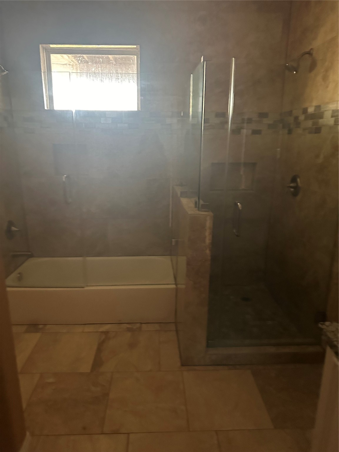 205 Rue Orleans Street Baytown, TX 77520 - Photo 23 of 43 a bathroom with a shower