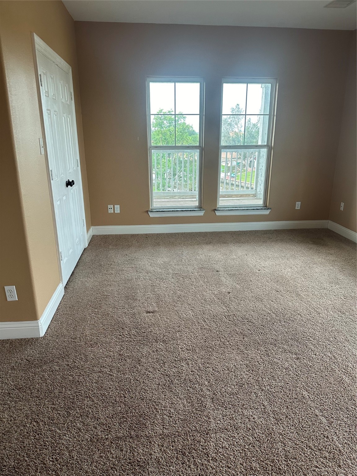 205 Rue Orleans Street Baytown, TX 77520 - Photo 10 of 43 an empty room with windows
