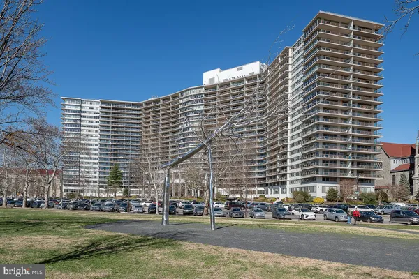 a front view of a building with street view