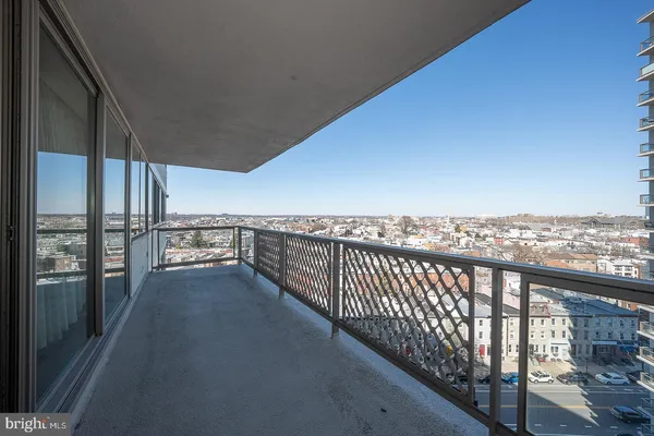 a view of a balcony with an ocean view