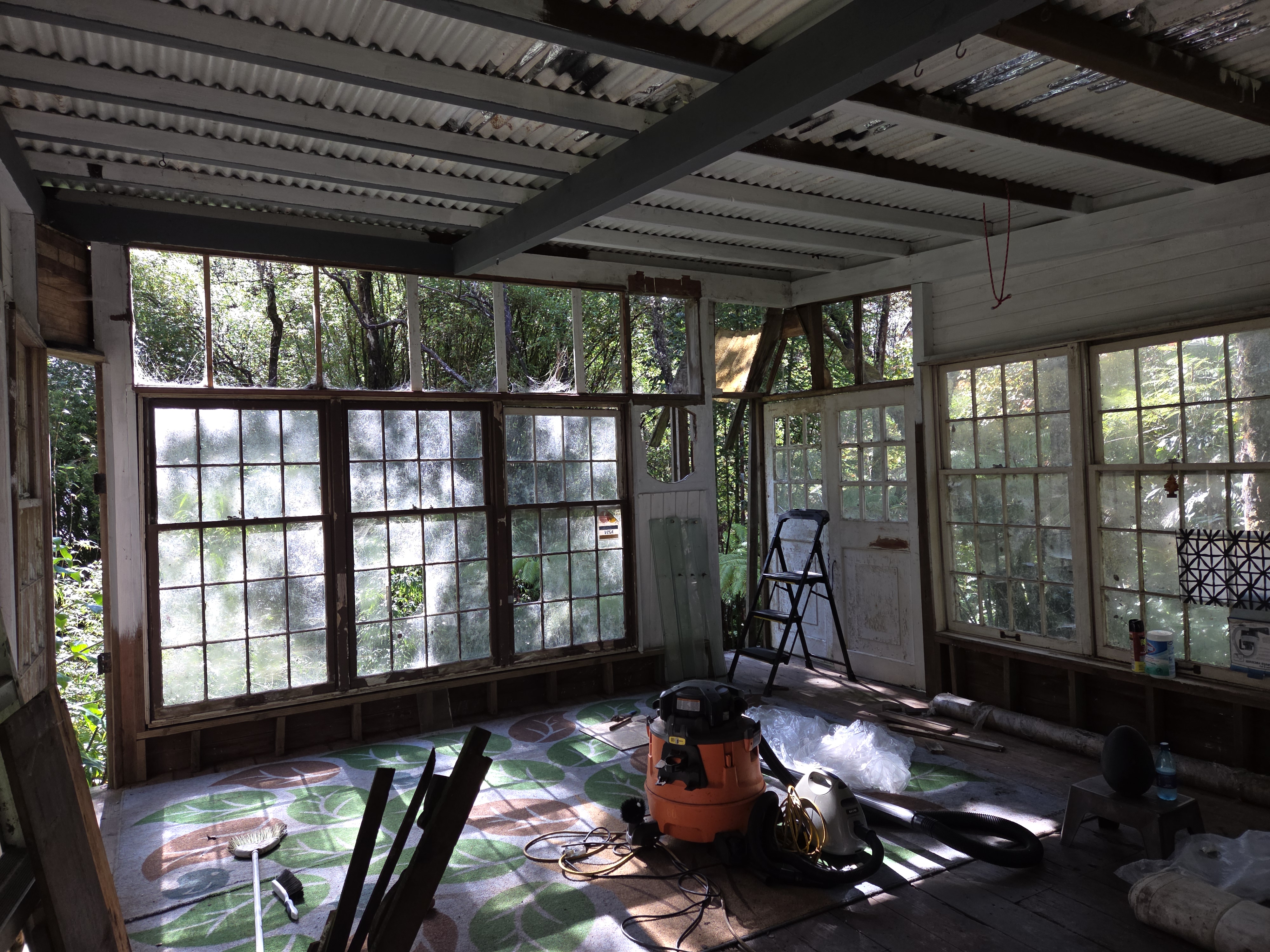 11-3885 6th Street Volcano, HI 96778 - Photo 14 of 23 a room with gym equipment and a large window