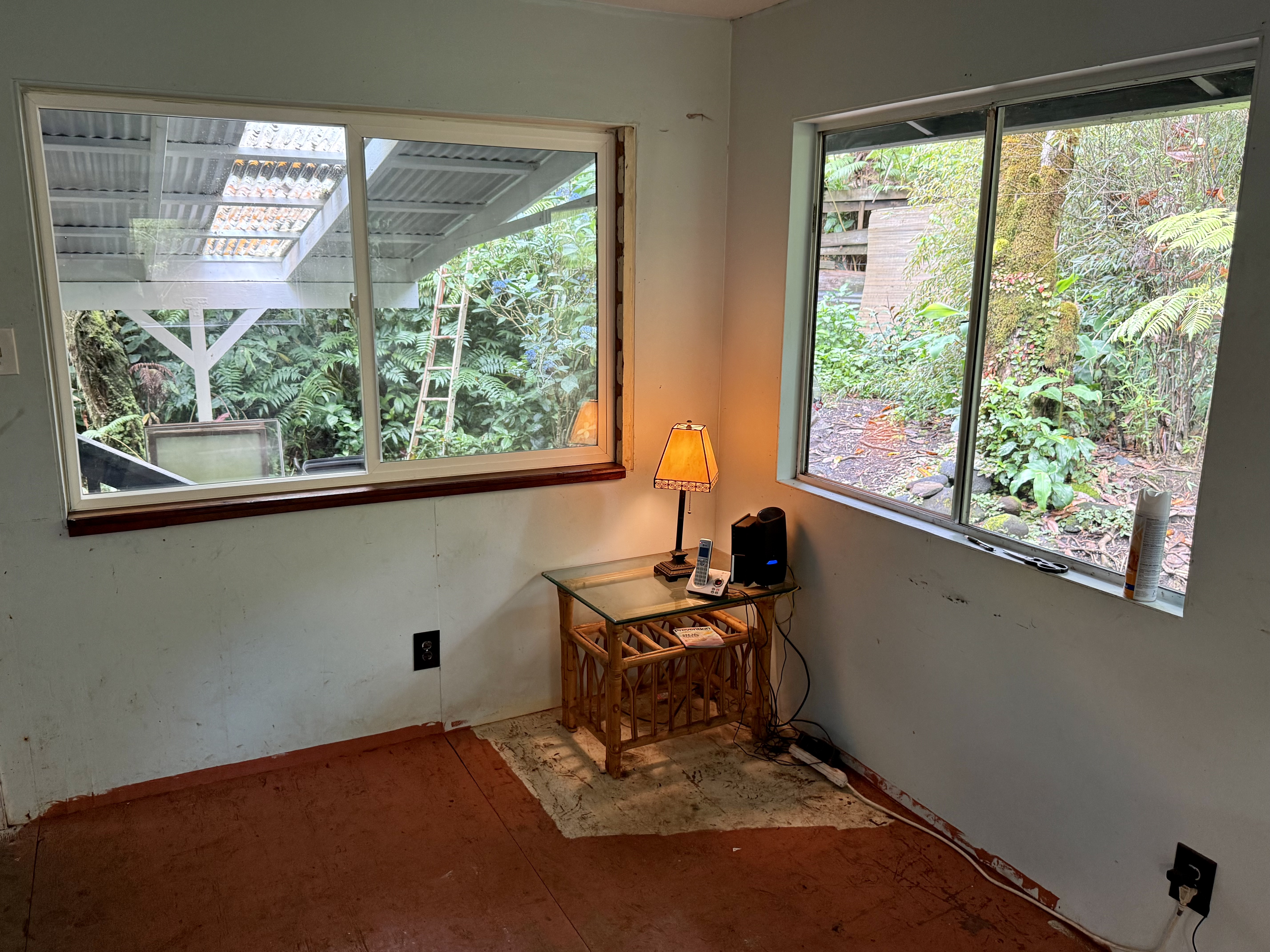 11-3885 6th Street Volcano, HI 96778 - Photo 8 of 23 a room with furniture and a window