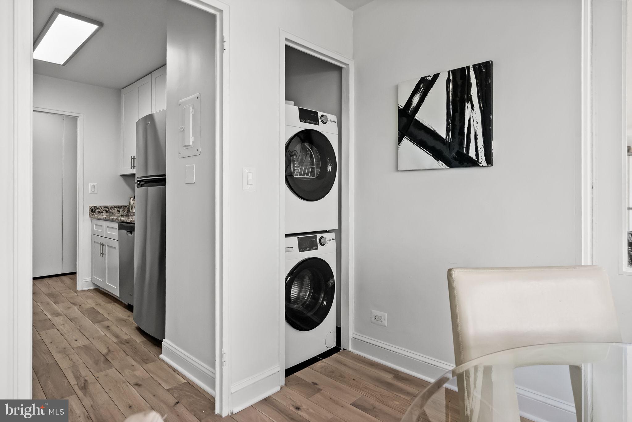 1600 Hagys Ford Road, Unit 8U Penn Valley, PA 19072 - Photo 23 of 44 a view of a storage and utility room with washer and dryer