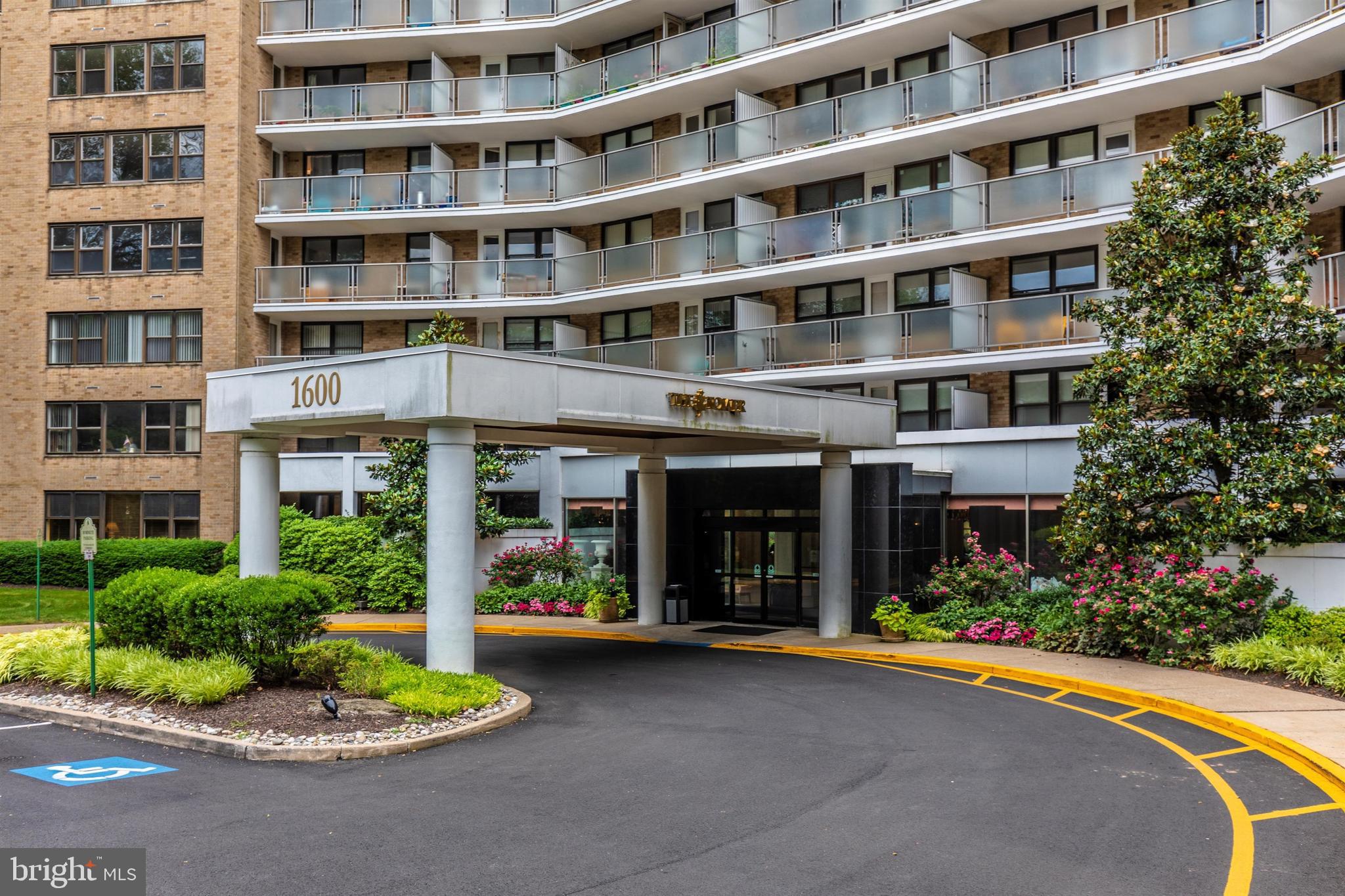 1600 Hagys Ford Road, Unit 8U Penn Valley, PA 19072 - Photo 3 of 44 a front view of a building with a garden