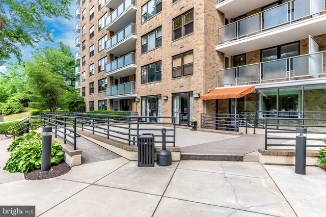 a view of a building with sitting area