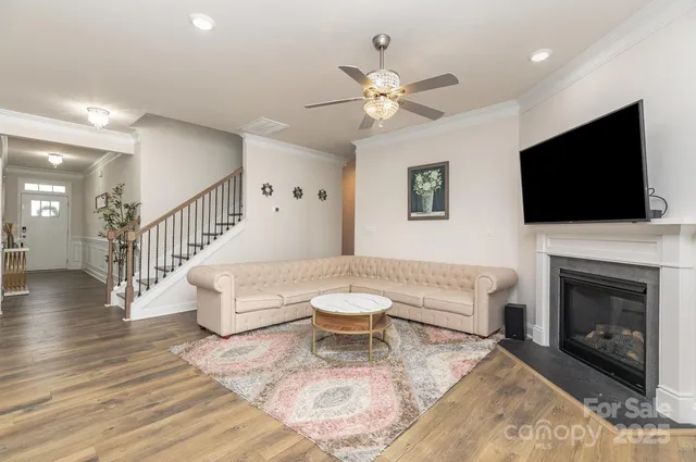 a living room with a couch and a flat screen tv