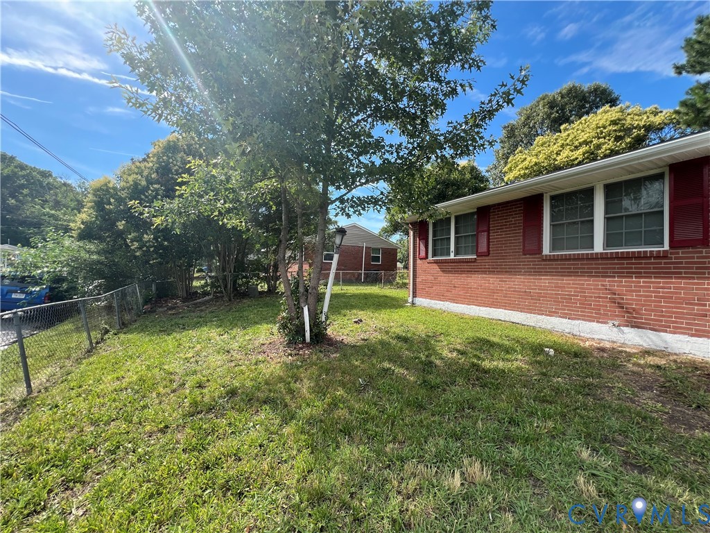 1403 Algona Road Chesapeake, VA 23324 - Photo 32 of 39 Brick exterior featuring red window shutters and w