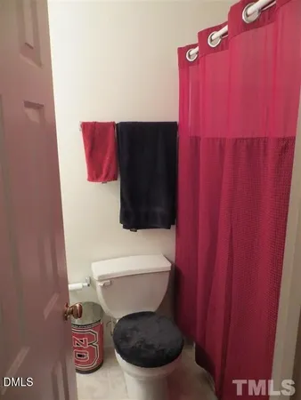 a view of entryway with a mirror and a window