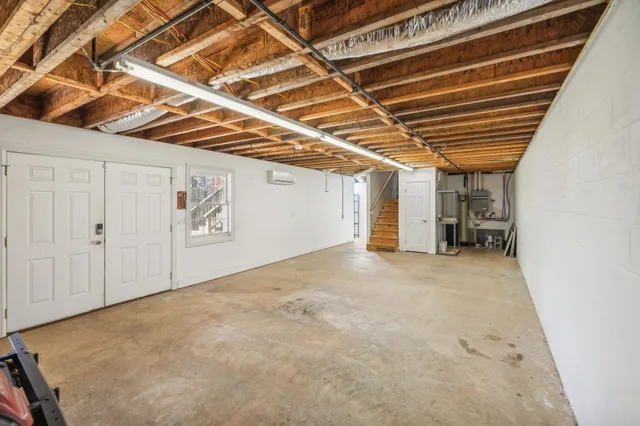 a view of a room with wooden walls