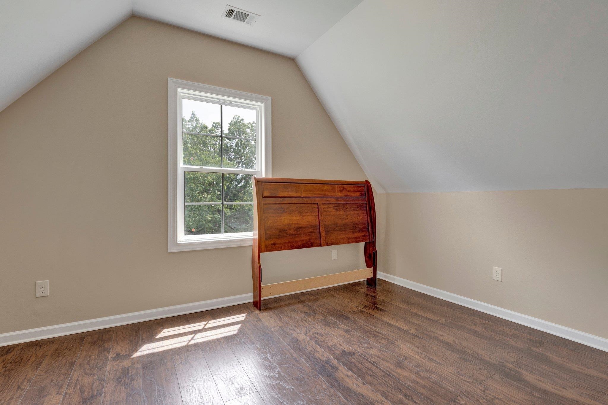 3270 Rast Road Millington, TN 38053 - Photo 33 of 40 Bonus room featuring lofted ceiling and dark wood-style flooring