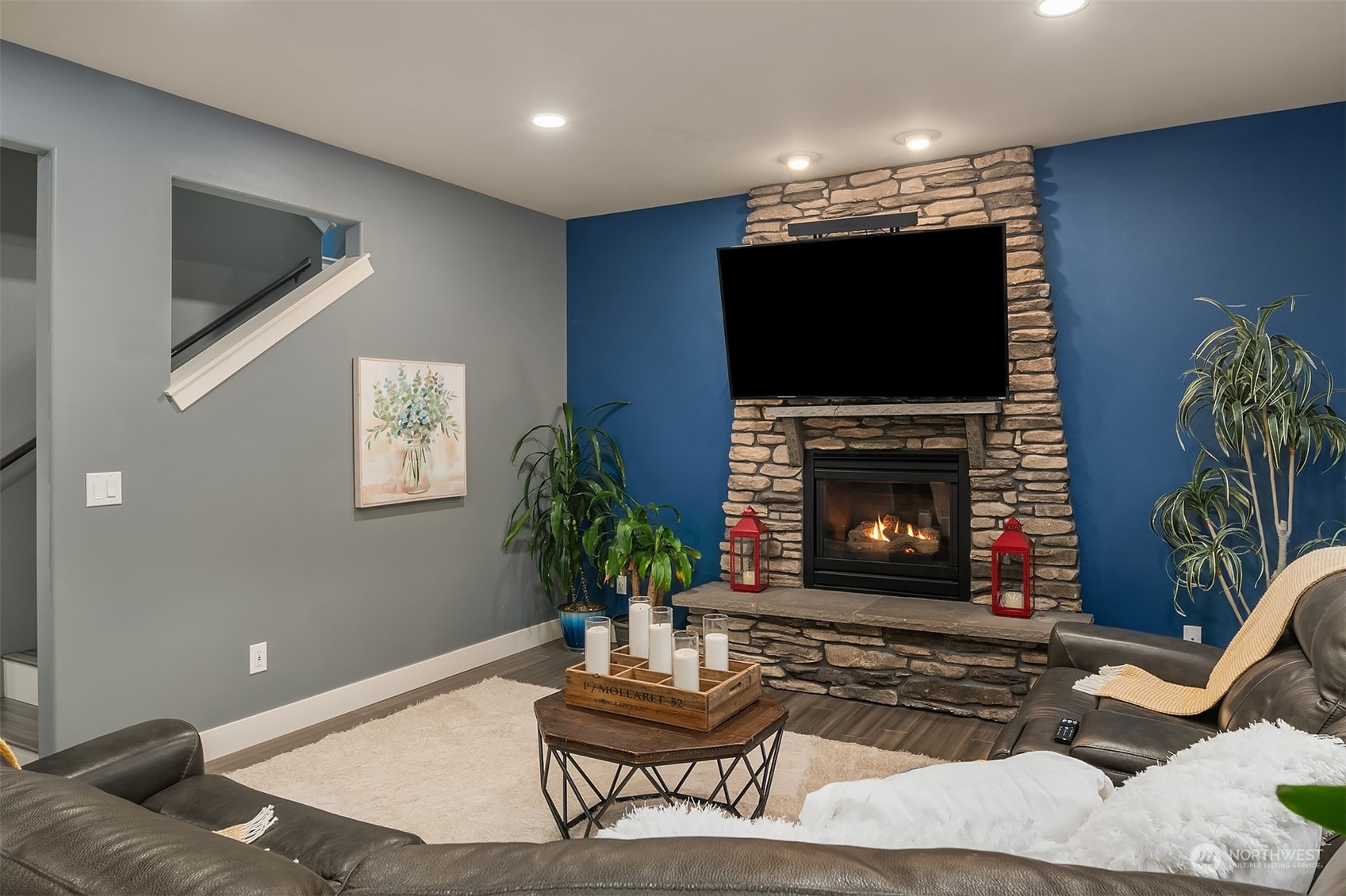 11520 56th Drive Southeast Everett, WA 98208 - Photo 14 of 30 a living room with furniture a flat screen tv and a fireplace