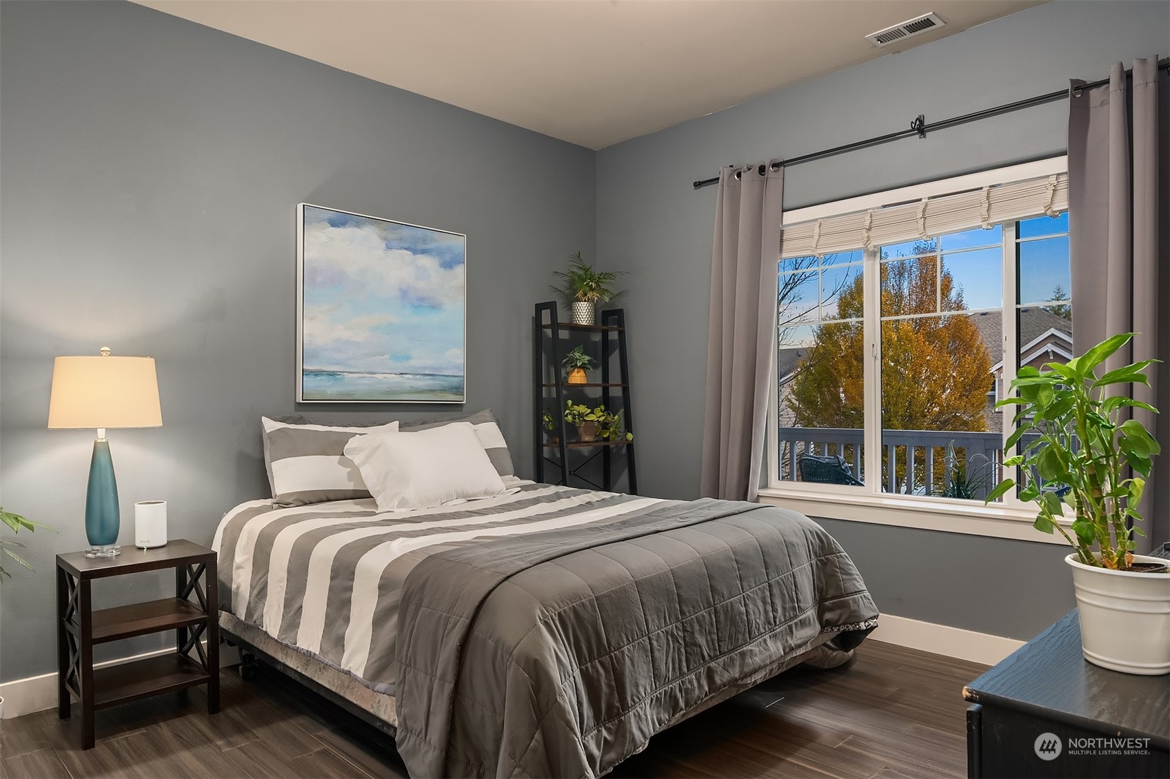 11520 56th Drive Southeast Everett, WA 98208 - Photo 23 of 30 a bedroom with a large bed and a large window