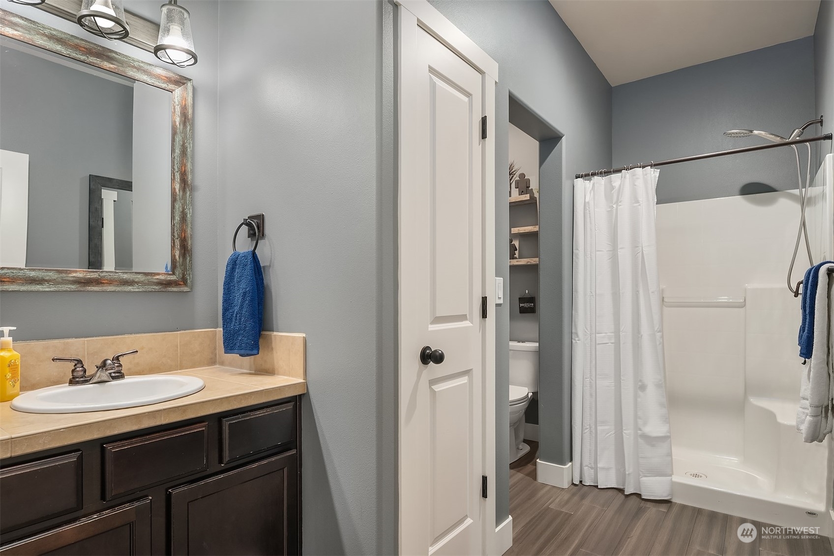 11520 56th Drive Southeast Everett, WA 98208 - Photo 24 of 30 a bathroom with a shower sink and mirror