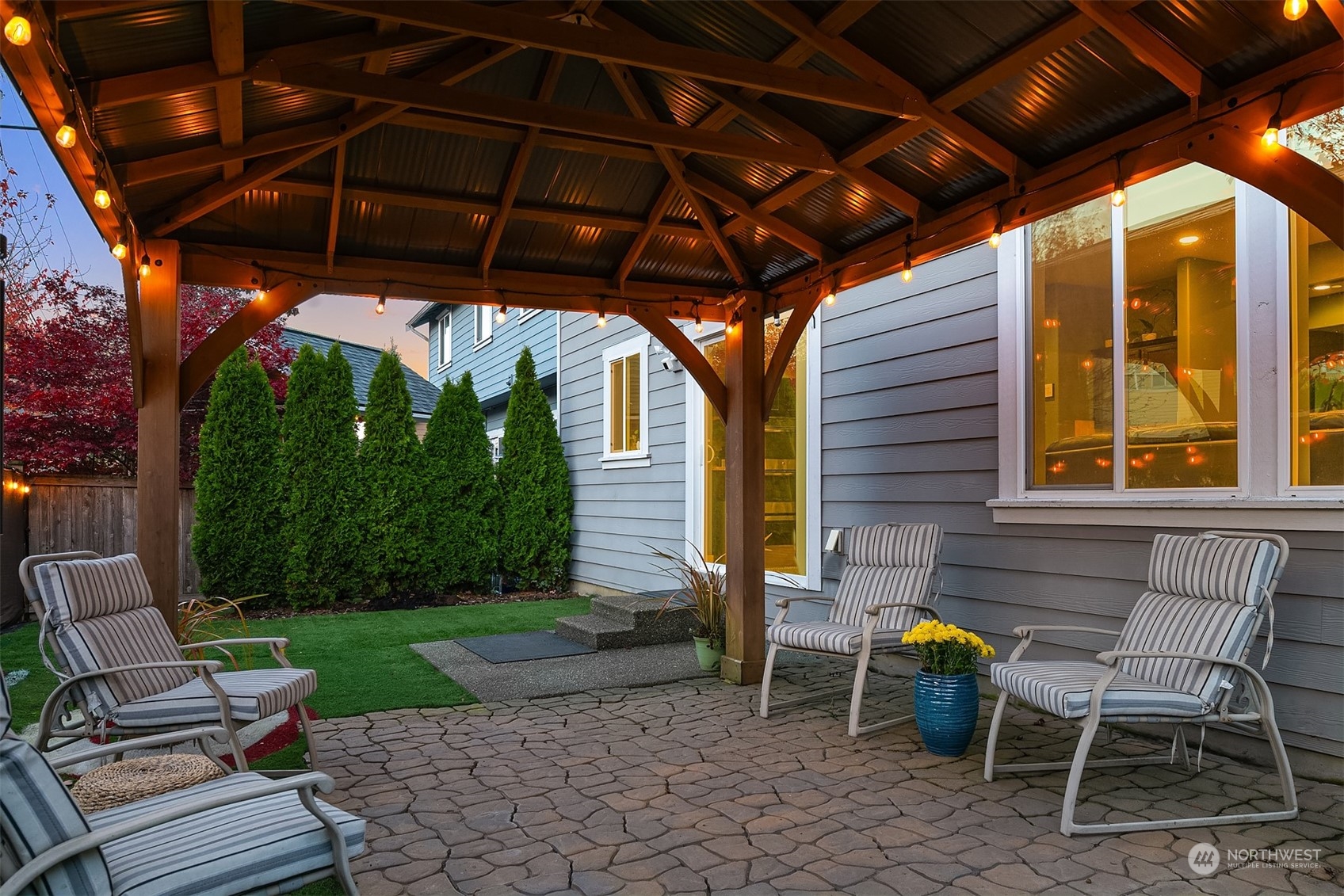11520 56th Drive Southeast Everett, WA 98208 - Photo 27 of 30 a patio with a table and chairs