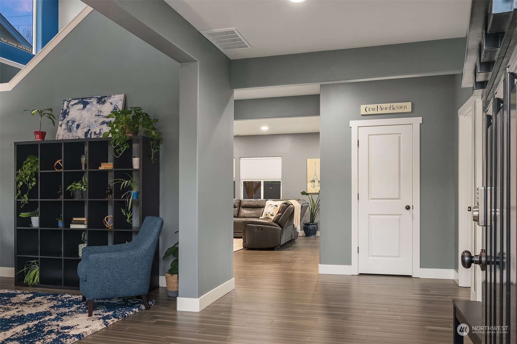 11520 56th Drive Southeast Everett, WA 98208 - Photo 4 of 30 a hallway with wooden floor and furniture