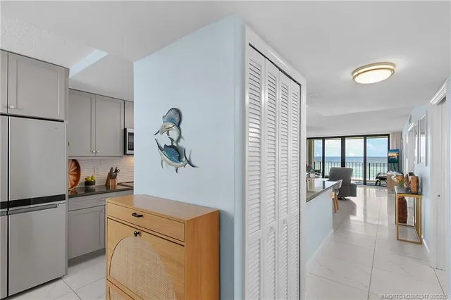 a view of living room with furniture and window