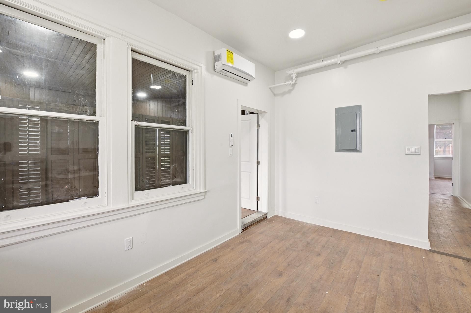 6012 Ridge Avenue, Unit 7 Philadelphia, PA 19128 - Photo 3 of 17 a view of an empty room with a window