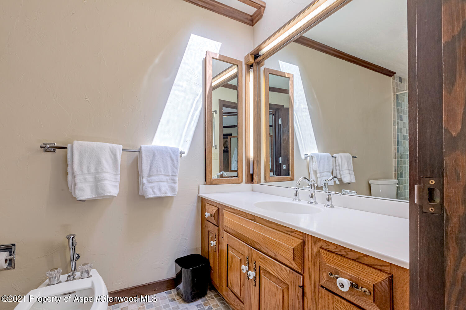 1441 Crystal Lake Road, Unit 2 Aspen, CO 81611 - Photo 4 of 20 a bathroom with a sink and a mirror