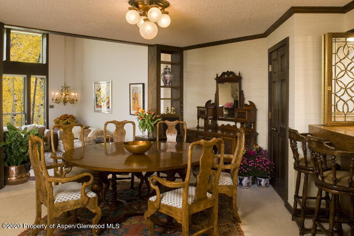 1441 Crystal Lake Road, Unit 2 Aspen, CO 81611 - Photo 7 of 20 a view of a dining room with furniture and window
