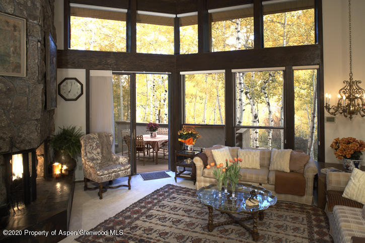 1441 Crystal Lake Road, Unit 2 Aspen, CO 81611 - Photo 10 of 20 a living room with furniture and a large window