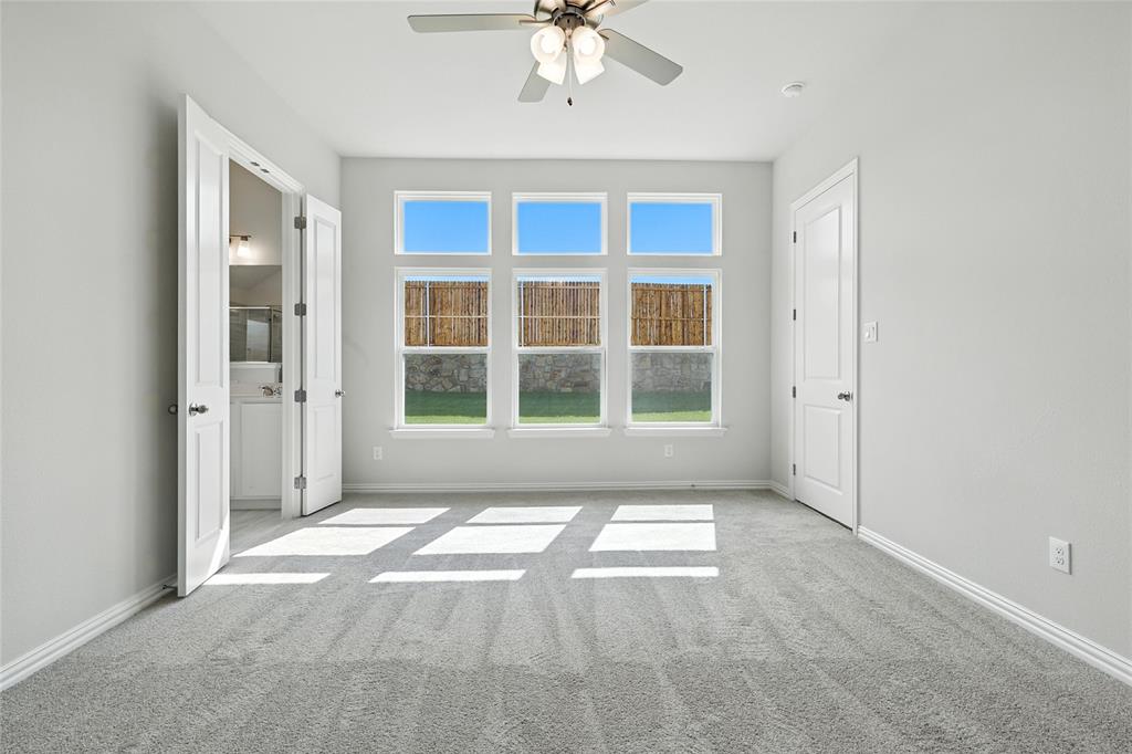 2311 Ridgecrest Lane Sherman, TX 75092 - Photo 13 of 40 a view of an empty room with a window