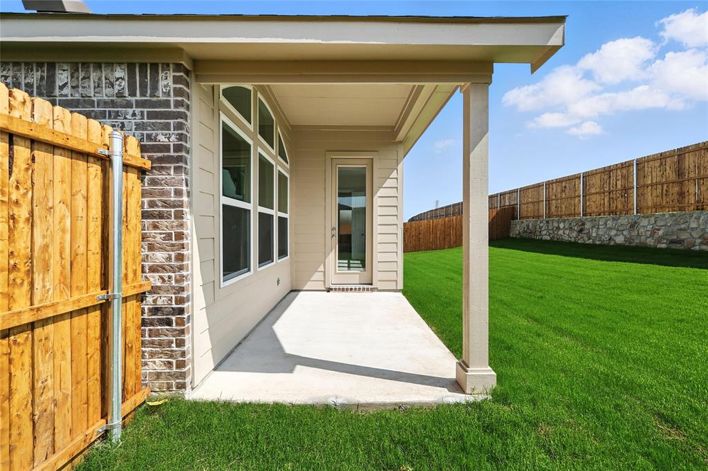 2311 Ridgecrest Lane Sherman, TX 75092 - Photo 27 of 40 a view of a back yard of the house