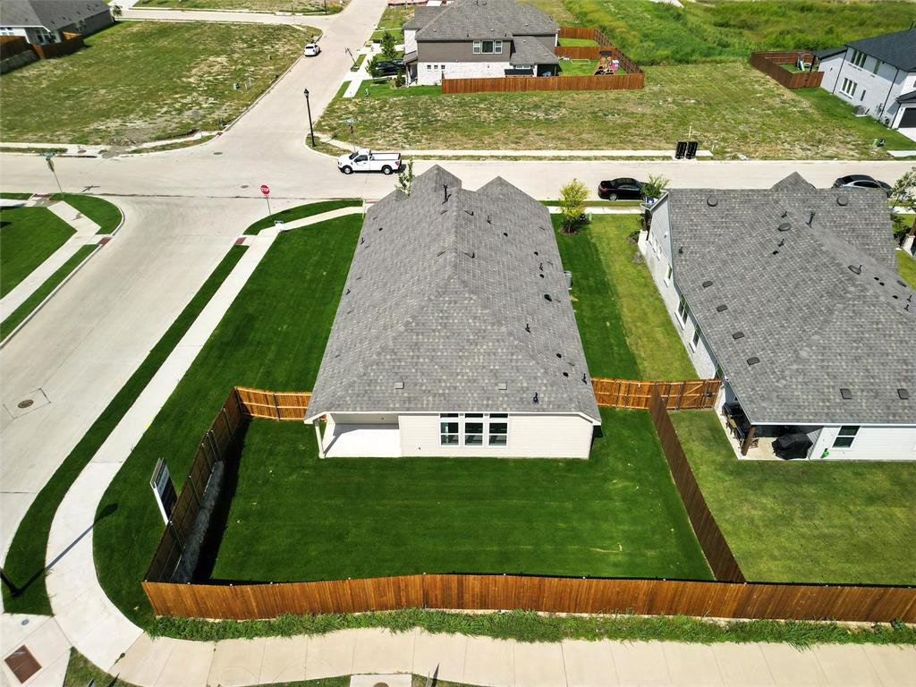 2311 Ridgecrest Lane Sherman, TX 75092 - Photo 29 of 40 an aerial view of a house with a garden
