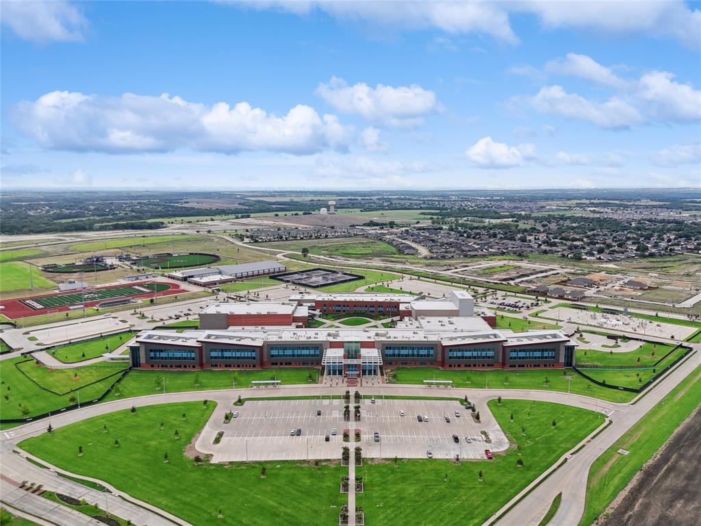 2311 Ridgecrest Lane Sherman, TX 75092 - Photo 30 of 40 a view of swimming pool with a garden and seating area
