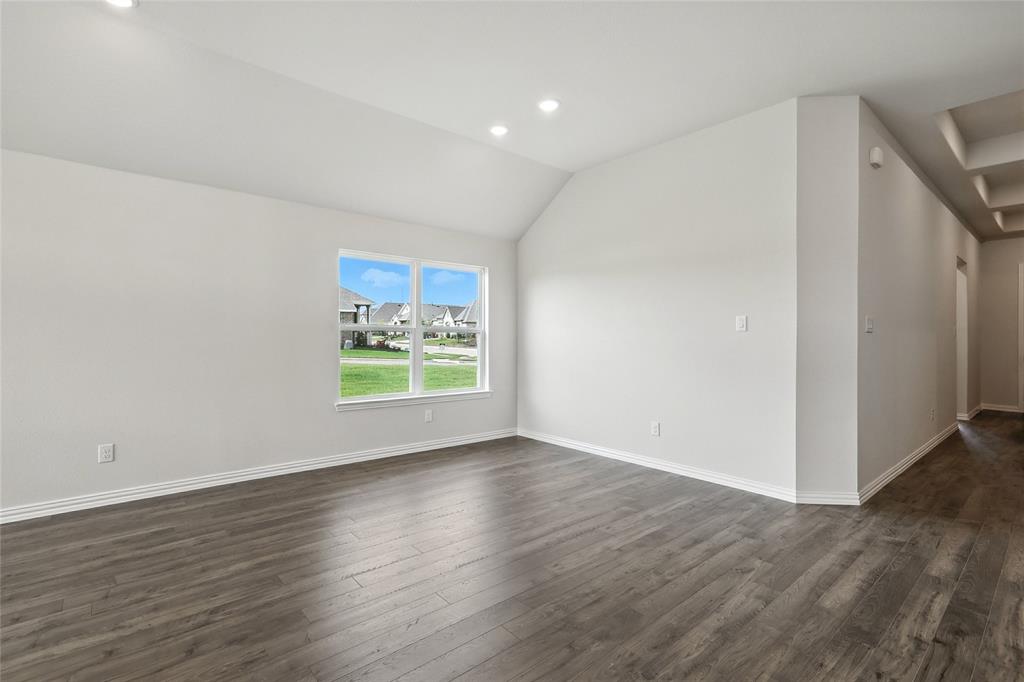 2311 Ridgecrest Lane Sherman, TX 75092 - Photo 8 of 40 a view of room with window and wooden floor