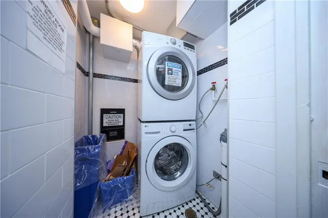 a view of washer and dryer in a utility room