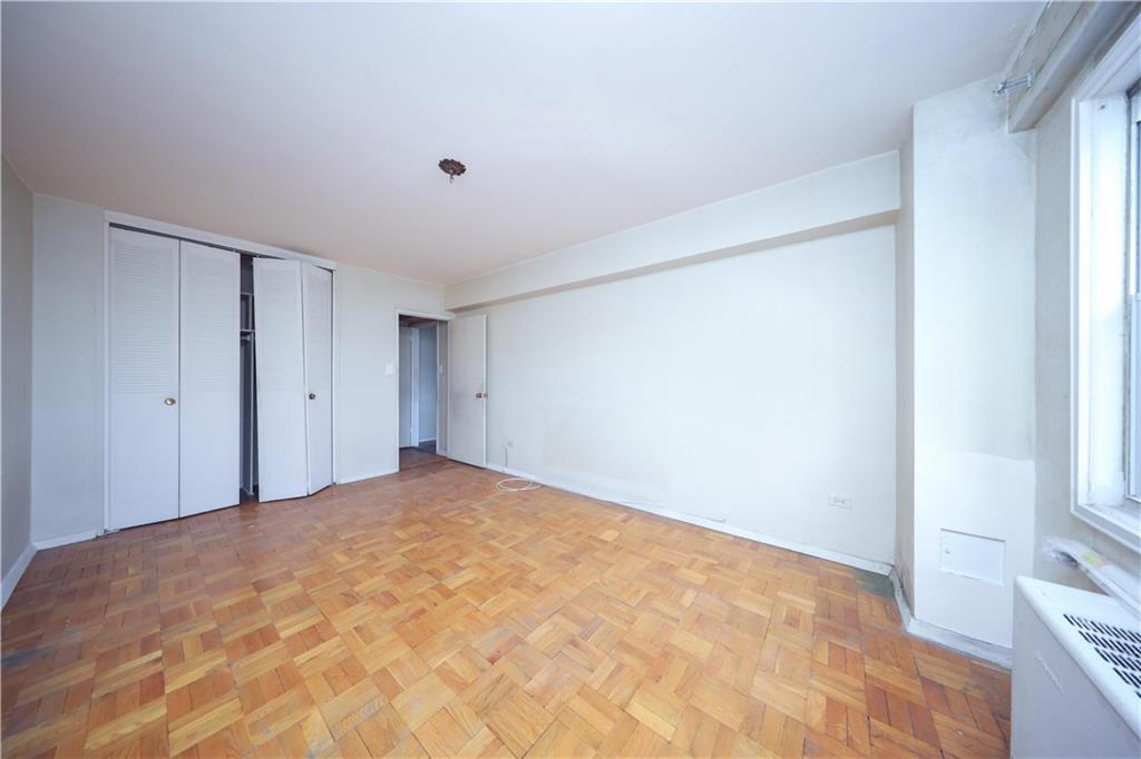 8901 Shore Road, Unit 7B Brooklyn, NY 11209 - Photo 9 of 11 a view of an empty room