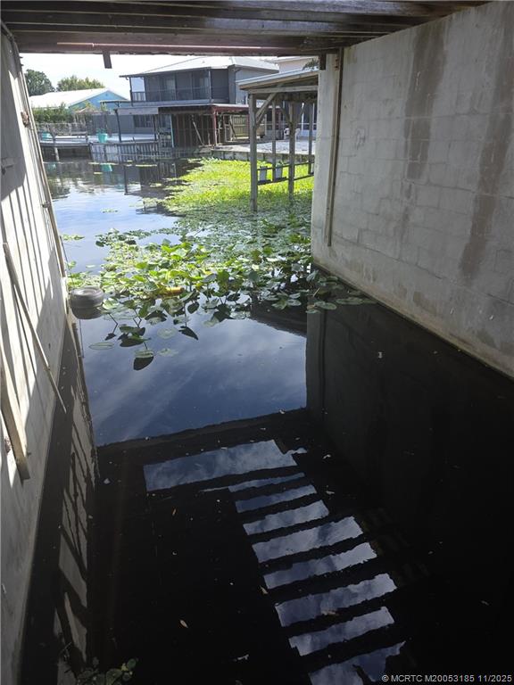 1023 Elm Street Okeechobee, FL 34974 - Photo 2 of 2 a view of a backyard of the house