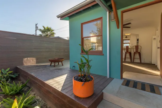 a view of a living room and dining room