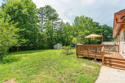 a view of a deck with a yard