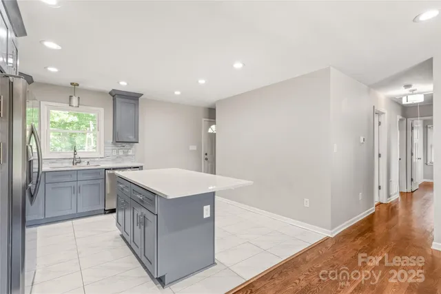 a kitchen with a cabinets and sink