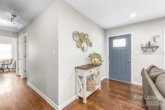 a view of livingroom with furniture and wooden floor