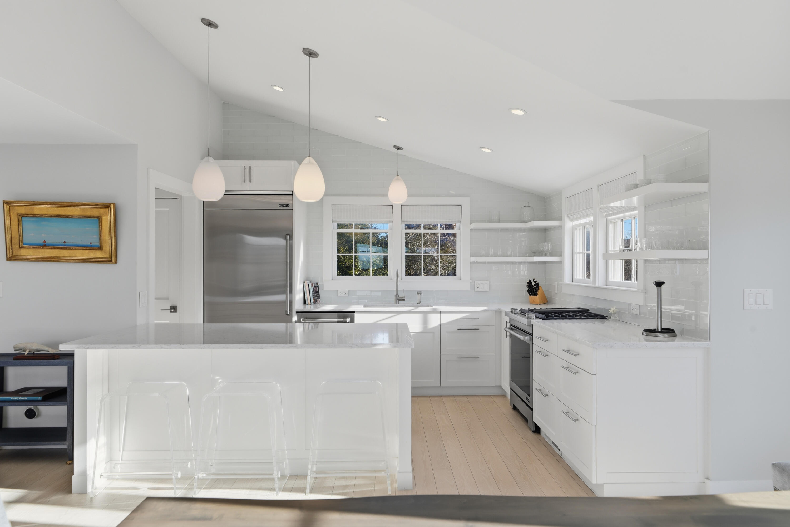 4 Goose Cove Way Nantucket, MA 02554 - Photo 13 of 36 a large white kitchen with a stove a sink a refrigerator and white cabinets