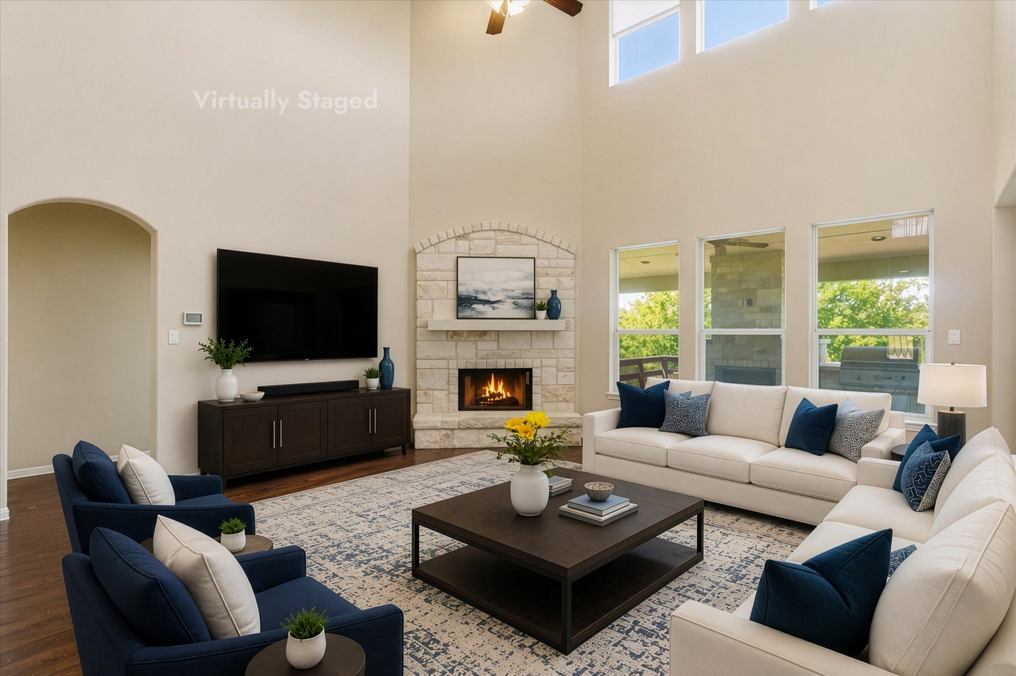 1511 Rimstone Drive Cedar Park, TX 78613 - Photo 15 of 39 This is an AI created staging image to appreciate A striking fireplace crafted from stone grounds this light-filled great room with soaring ceilings connected to upscale kitchen.