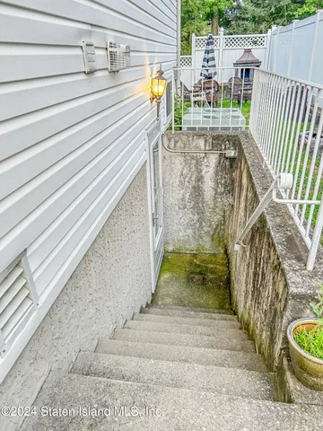 a kitchen with a table and chairs