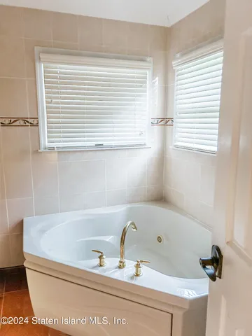 a bathroom with a toilet and a sink