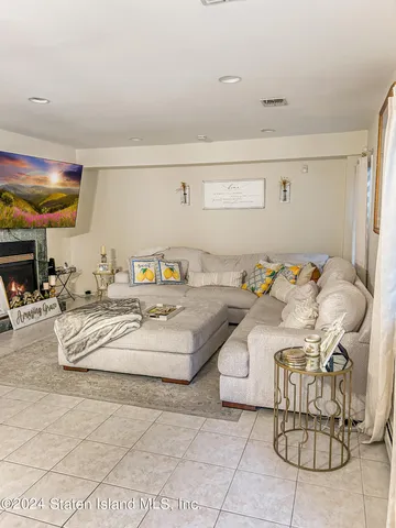 a bedroom with a bed and a table