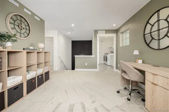 a large white room with a large window and furniture