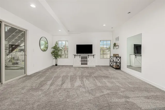 a view of a livingroom with a flat screen tv