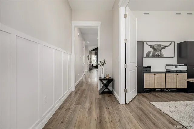 a view of a kitchen from the hallway