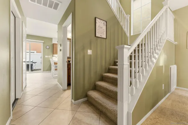 a view of an entryway with seating area