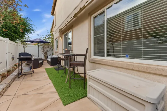 a backyard of a house with seating space