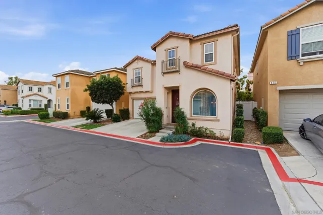 an aerial view of a city with lots of residential buildings